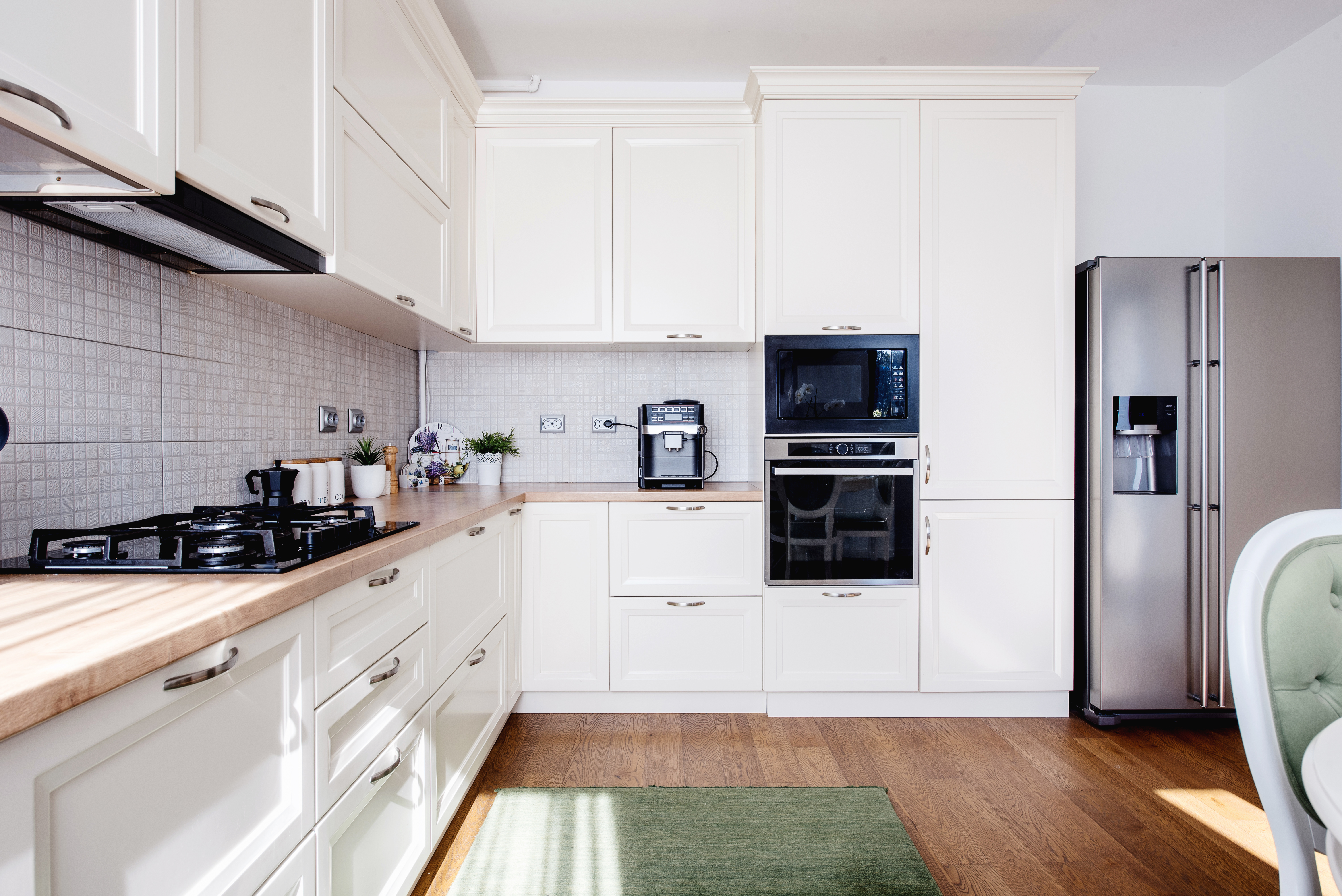 Clean, modern kitchen with new flooring.